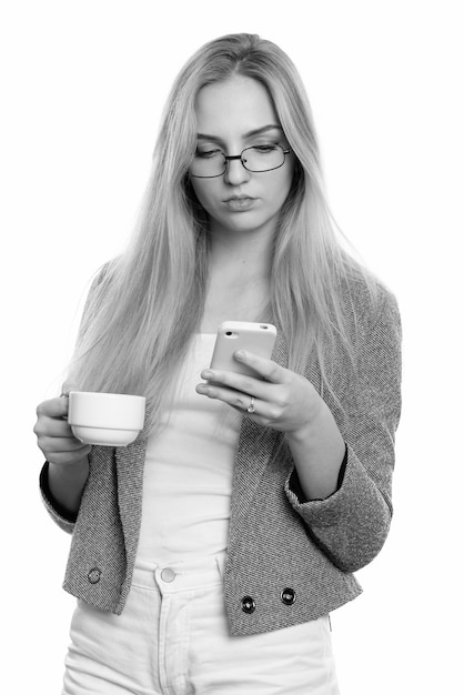 Close up of young beautiful businesswoman with blond hair isolated