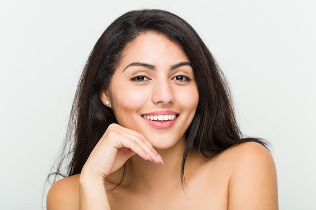 Close up of a young beautiful and natural hispanic woman