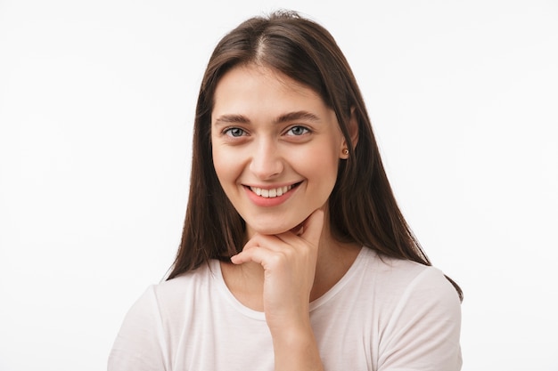 Close up of a young beautiful woman posing isolated