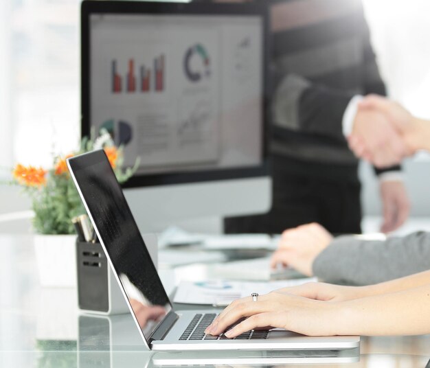 Close up of young business woman at workplace