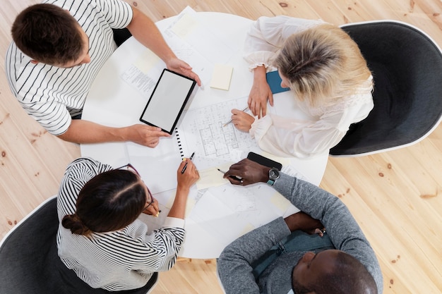 Photo close up on young colleagues having a meeting