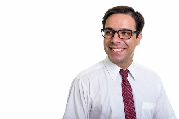 Close up of young happy Persian businessman smiling