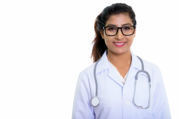 Close up of young happy Persian woman doctor smiling with eyeglasses