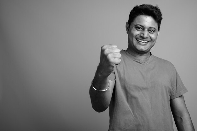 Close up of young Indian man wearing shirt