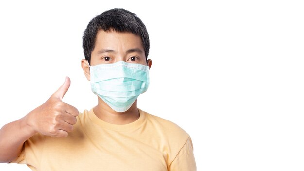 Close up of young male wearing a protective face mask isolated on white background. clipping path.