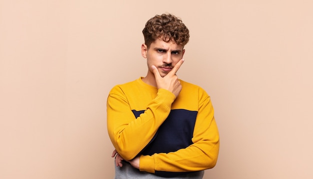 Close up on young man looking serious