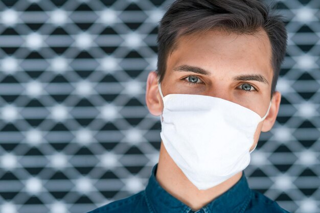 Close up a young man in a protective mask  concept of health protection