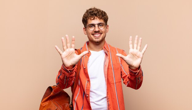 Close up on young man smiling in the studio