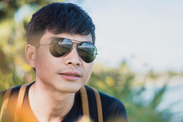 Close-up of young man wearing sunglasses