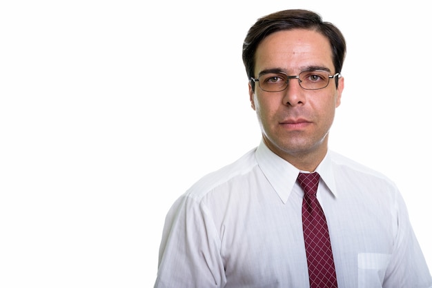 Close up of young Persian businessman with eyeglasses