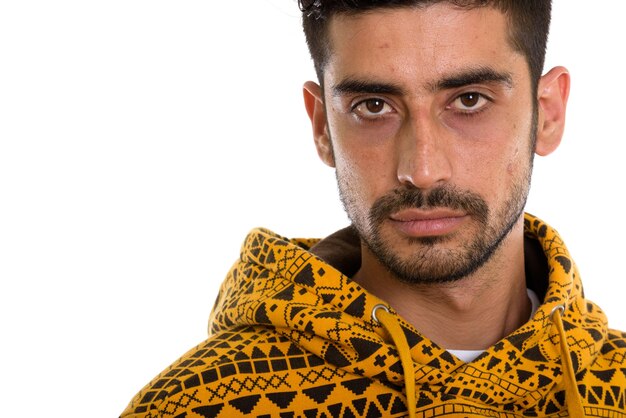 Close up of young Persian man wearing hoodie