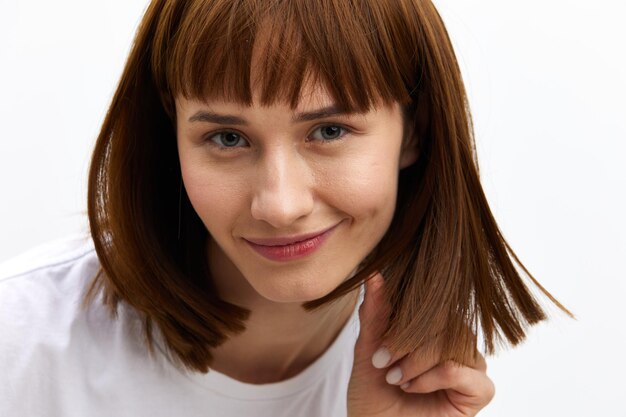 close-up of young woman against white background