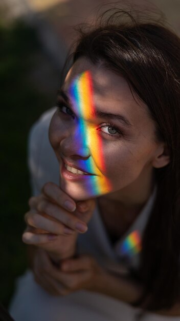 Photo close-up of young woman blowing bubbles