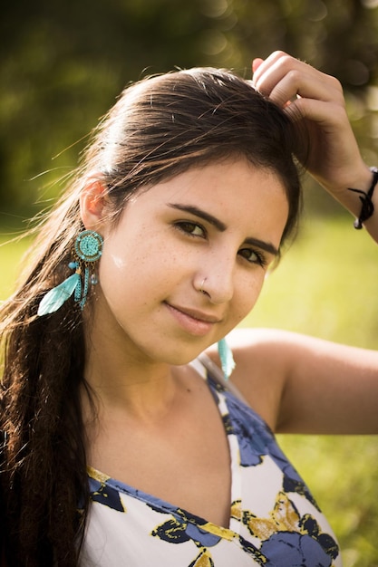 Close-up of young woman at park