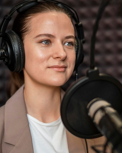 Close-up young woman at radio