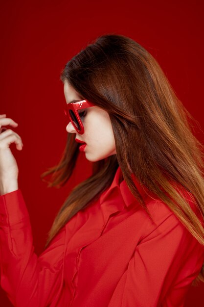 Close-up of young woman wearing sunglasses