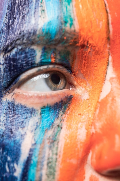 close-up of young woman with painted face