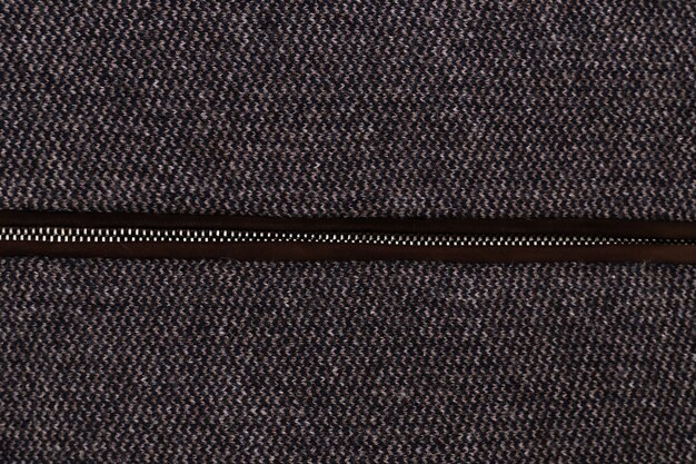 Close-up of zipper on fabric