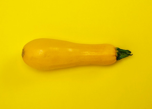 Close-up of zucchini against yellow background