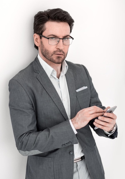 Close upa modern businessman with a smartphone