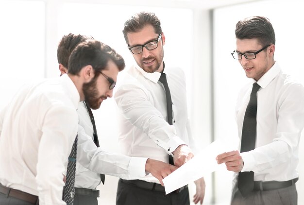 Close upbusiness colleagues discussing business documents