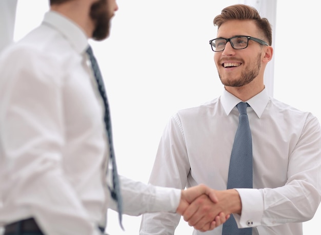 Close upbusiness handshake of business people on a light background