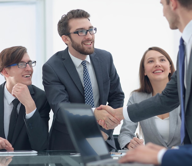 Close upbusiness handshake at the desk