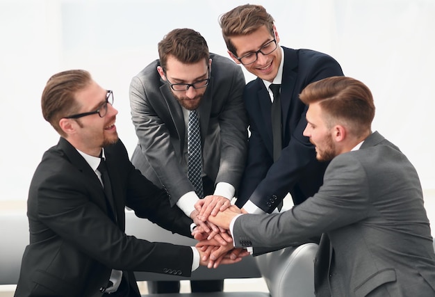 Close upbusiness partners gesture show their unanimityphoto with copy space