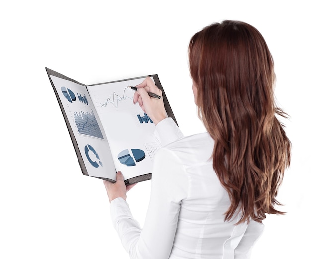 Close upbusiness woman signing a financial document