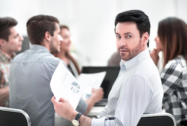 Close upbusinessman and business team at the Desk