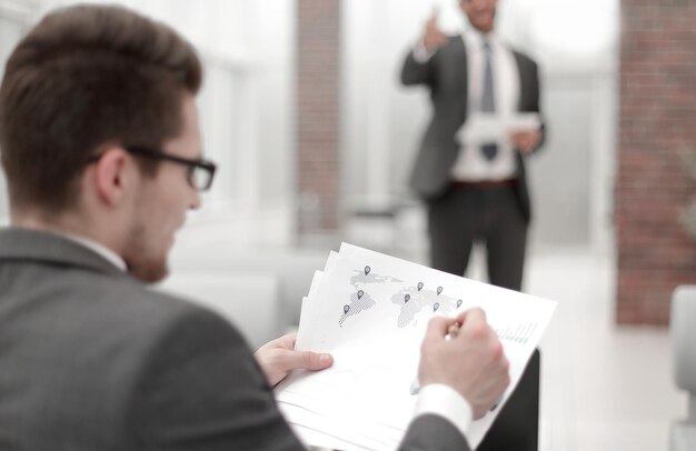 Photo close upbusinessman checking financial data