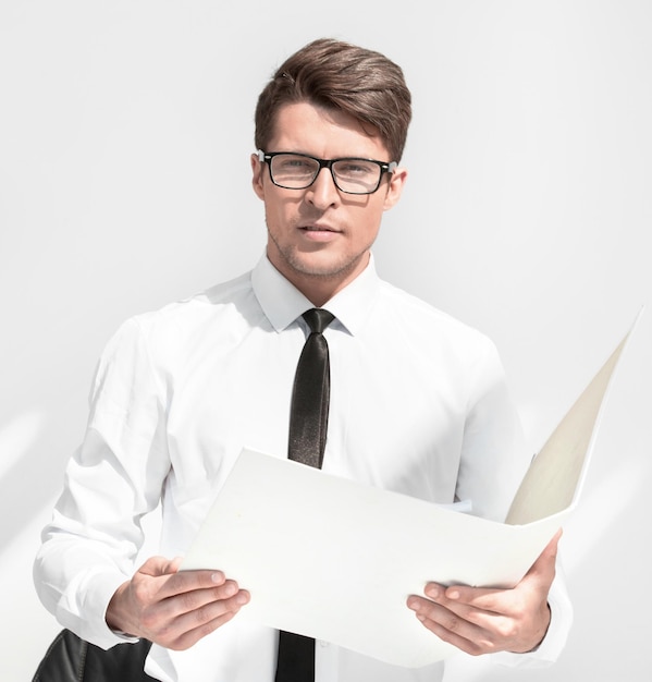 close upbusinessman studying the terms of the contract