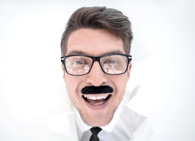 Close upbusinessman with glasses looking at you