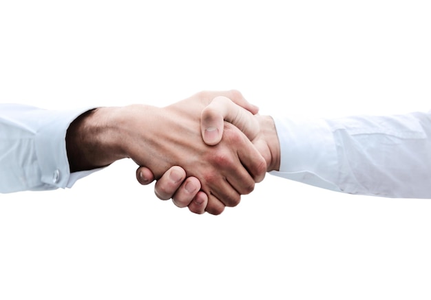 Close upcolleagues shaking hands over a Desk