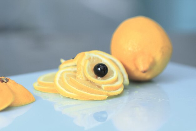 Close upslices of lemon on the cutting board