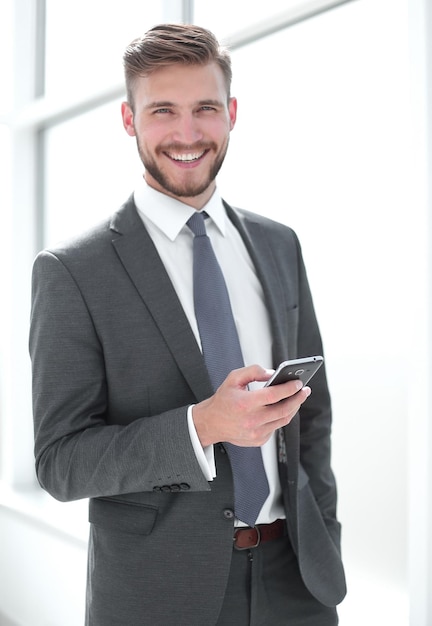 Close upsuccessful businessman on the background of the office window