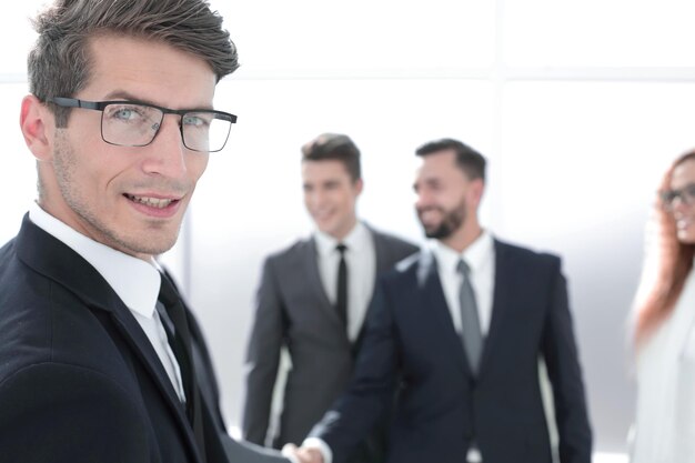 Close upsuccessful businessman standing in the office business concept