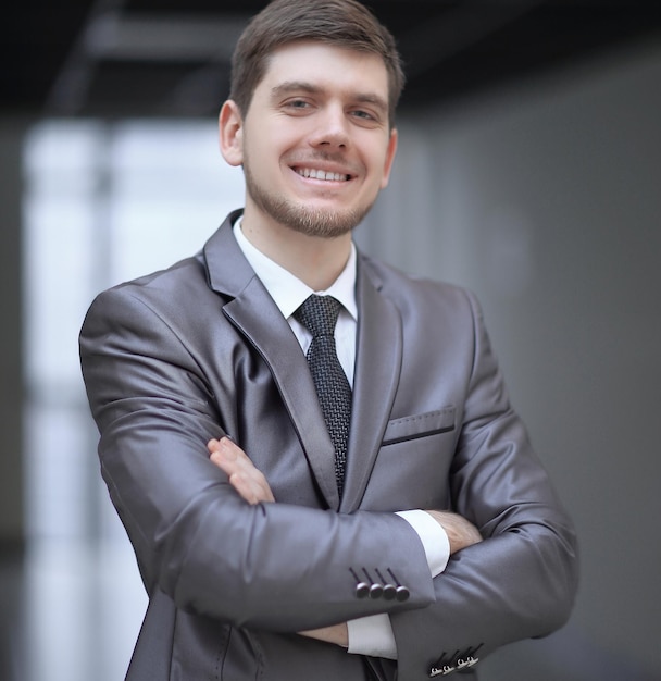 Close upvery happy businessman in his office