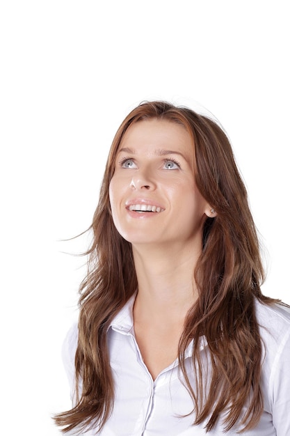 Close upyoung business woman looking up at copy space