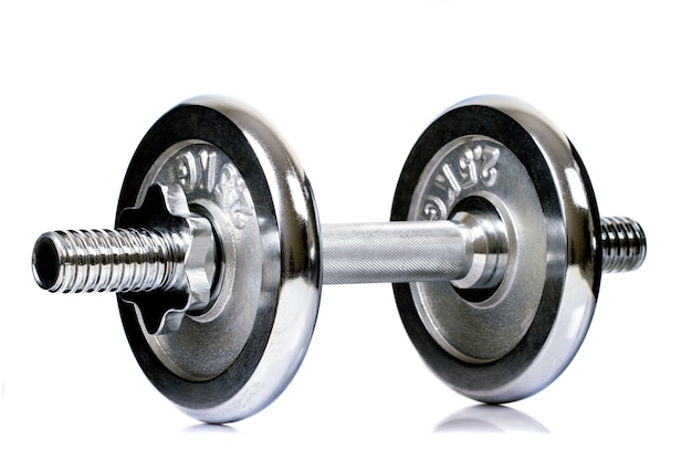 Close view of a chrome dumbbell equipment isolated on a white background.