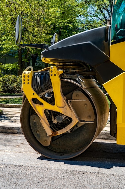 Close view of drum roller at the construction site working on the new road