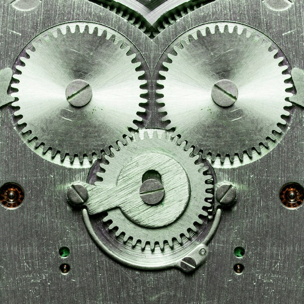 Photo close view of old clock mechanism with gears and cogs for your successful business design macro