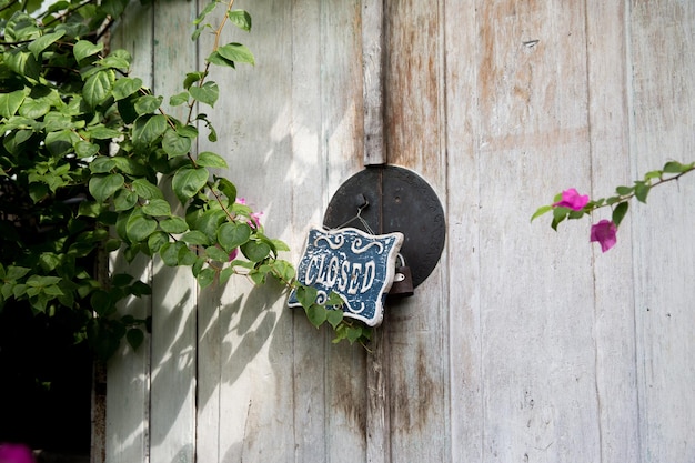 Closed board on wooden white decorative door