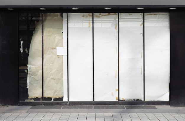 Closed or empty shop or store storefront with blocked windows