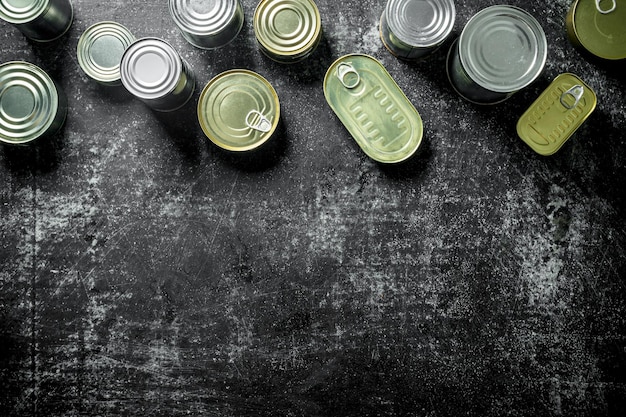 Photo closed metal cans of canned food