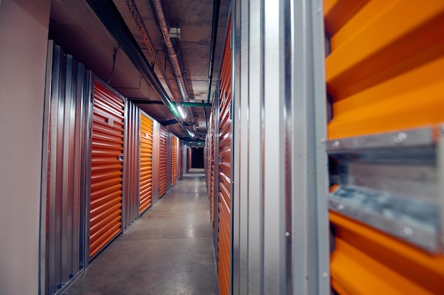 Closed modern storage boxes in warehouse