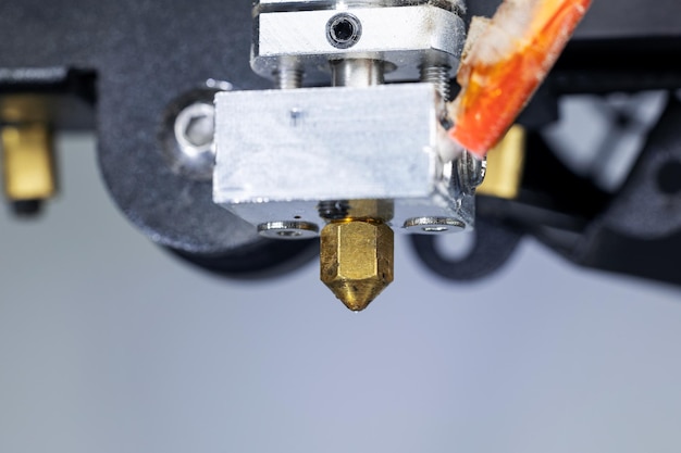 Closeup of a 3D printer printhead hotend and extruder from a 3D printer