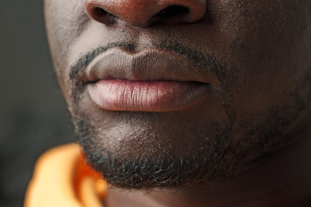 Closeup of african mans lower face and lips