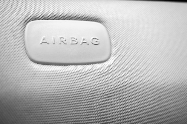 Closeup of airbag sign inside the car