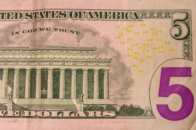 Photo closeup of the american five dollars banknote